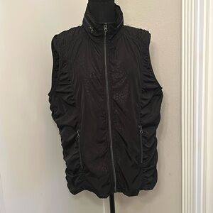 Saks Fifth Avenue zip front vest. Tonal animal print, zip pkts, hidden zip hood